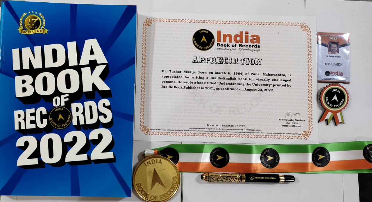 Dr. Nikalje's Braille English book in the India Book of Records